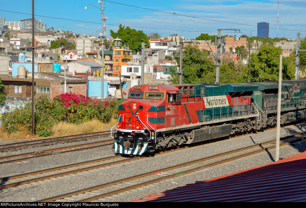 FXE ES44AC Locomotive leading a train